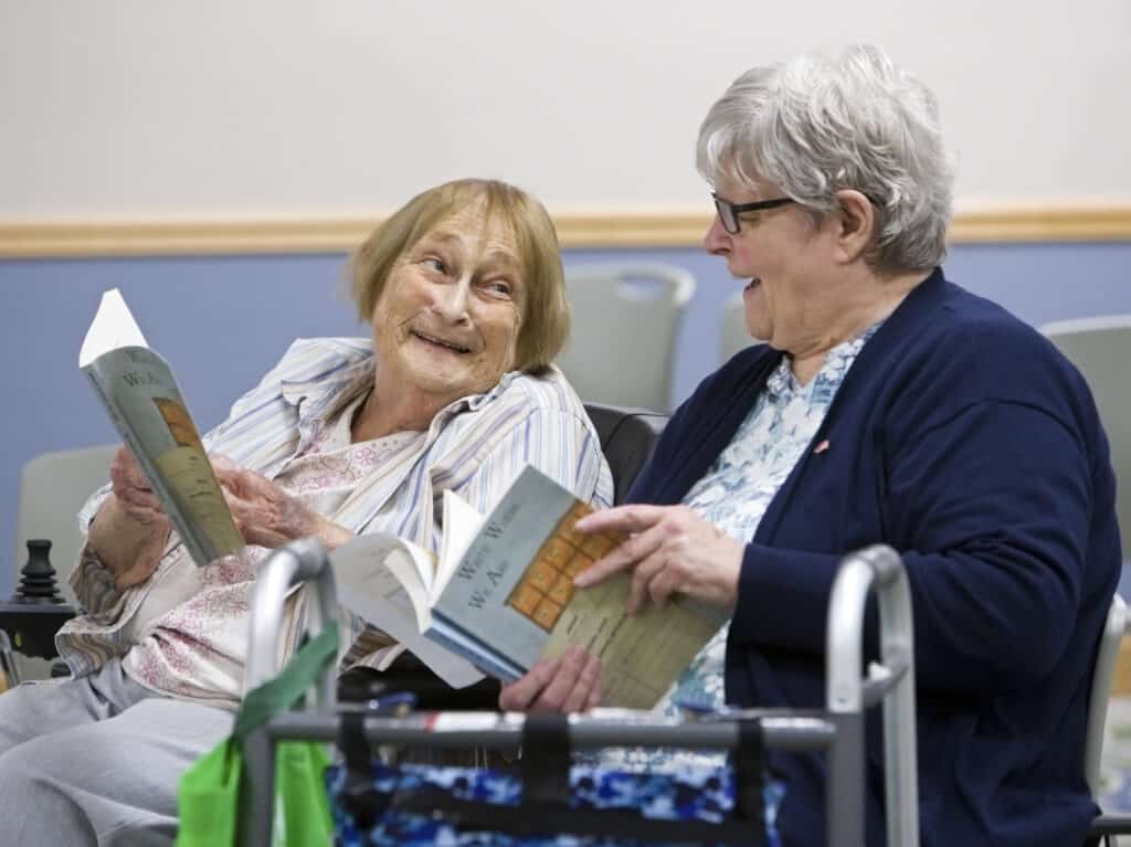 Timbers of Shorwood residents Barb Rossi and Lucy Hoffman